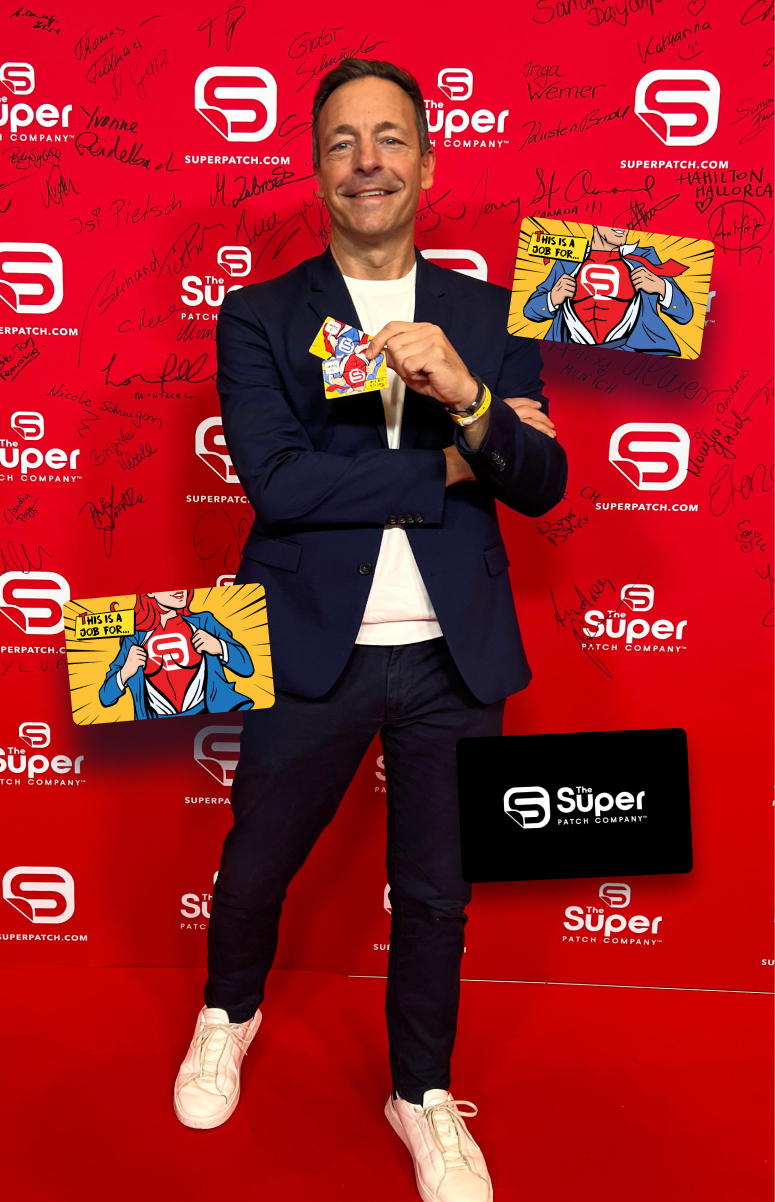 An image of an entrepreneur showing off his credit card sized NFC mySmartpage business cards.